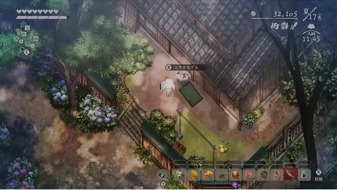 三毛猫のそばでエサをあげる操作が表示されたゲーム画面